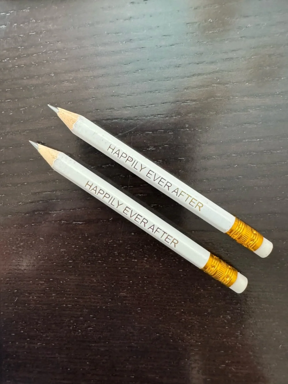 Happily Ever After pencils, heart, shaped wooden tags, and metal heart charms